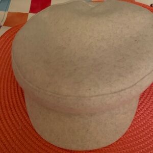 Ladies brim cap ivory color one size adjustable elastic headband .polyester
